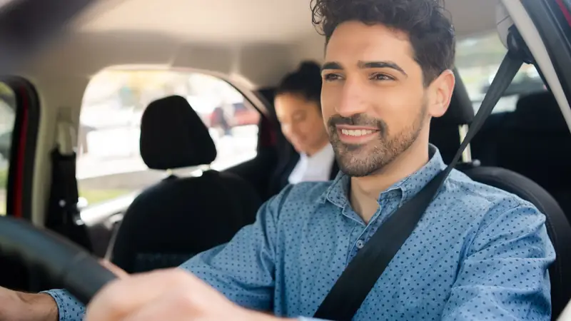 Rideshare driver with a passenger